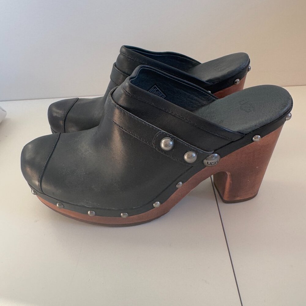 Uggs = Black leather Clog Mules .